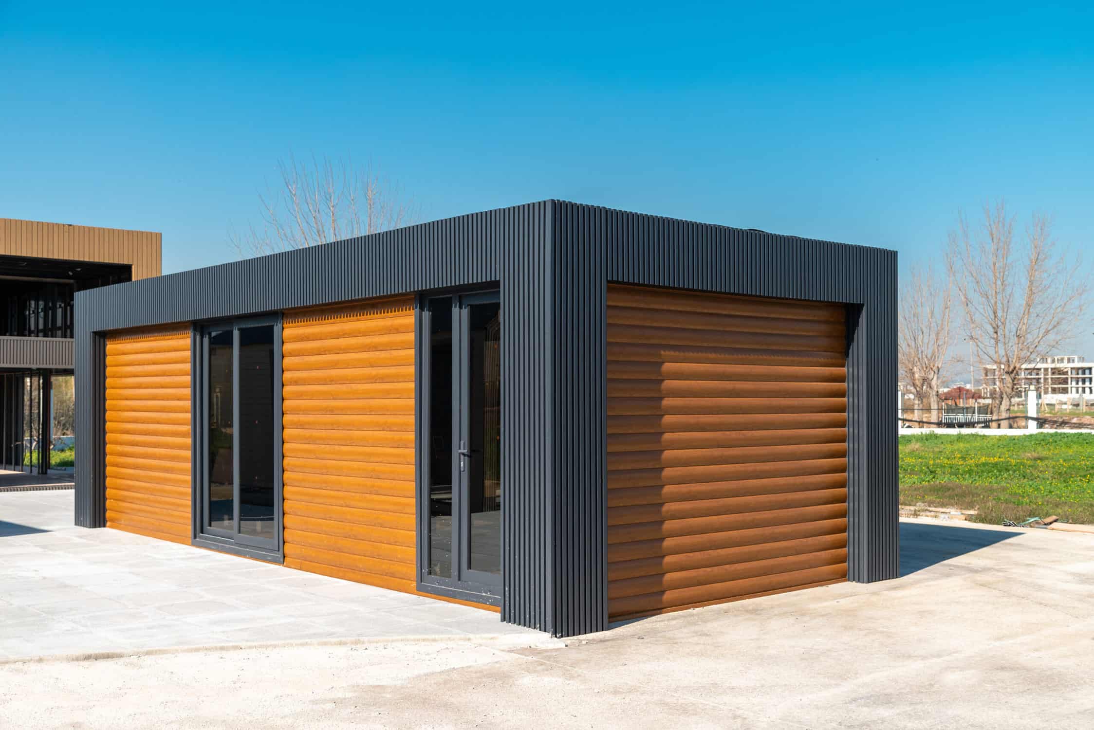 Newly built metal framed building with siding. Construction of a new tiny house. selective focus.