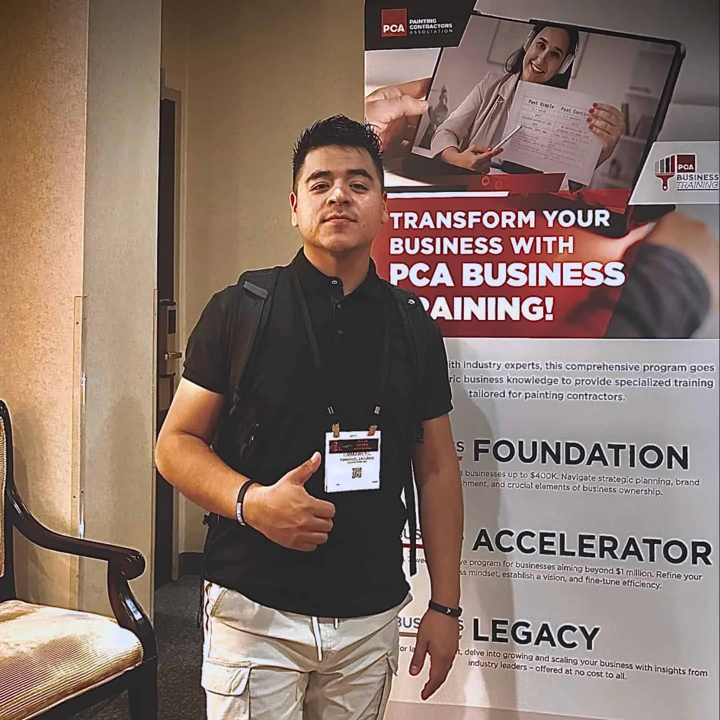 Emmanuel Manny Lagunas standing at PCA business training conference