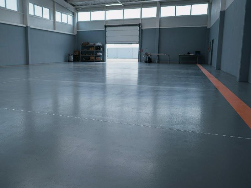 Polyurea coated concrete floor with a smooth, durable finish, installed by Lagunas Painting in the Treasure Valley, Idaho